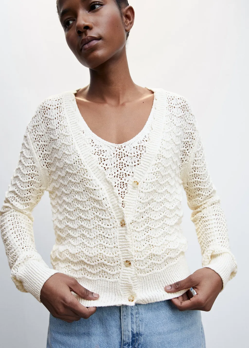 Cardigan traforato bordi ondulati