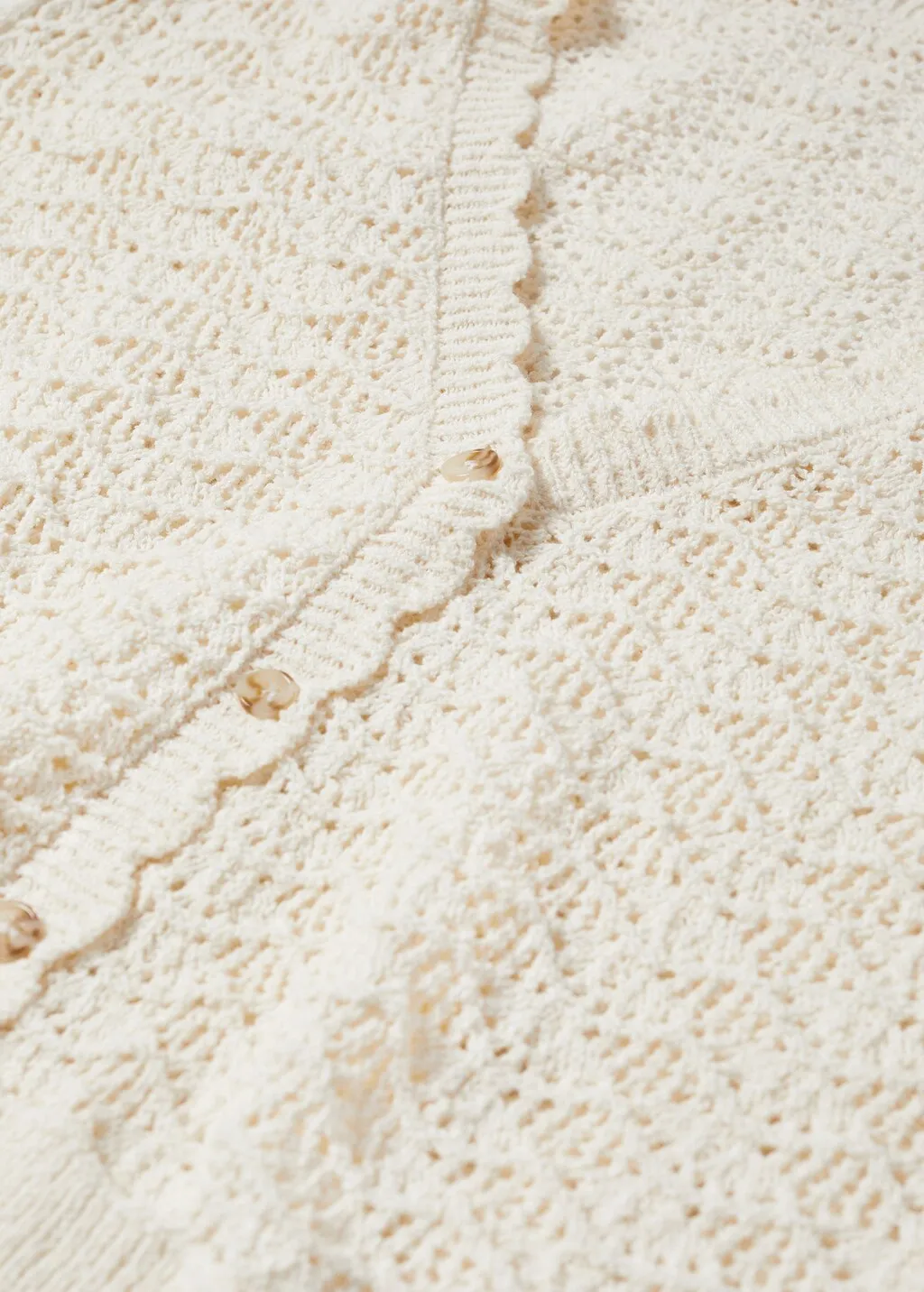 Cardigan traforato bordi ondulati