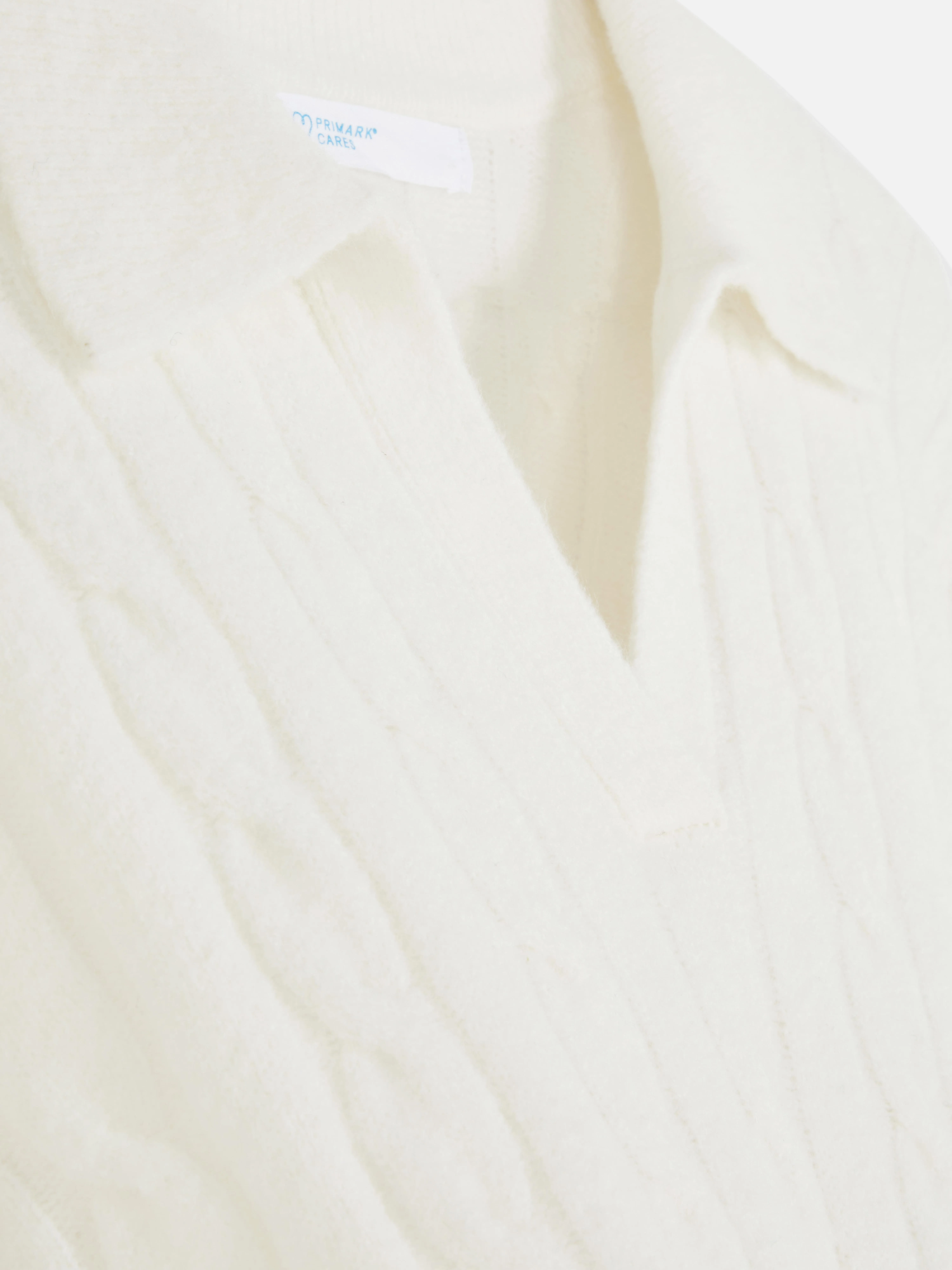 Dolcevita in maglia a trecce