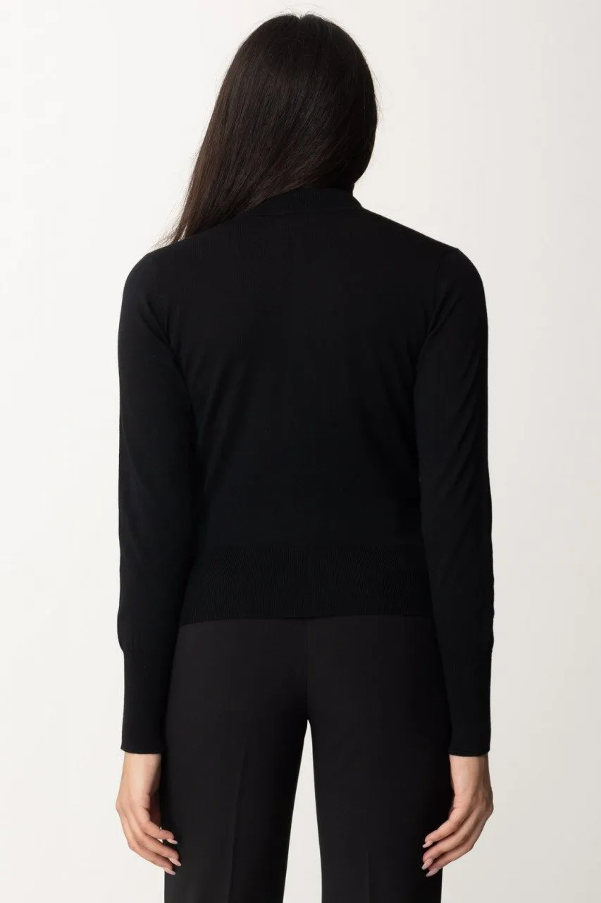 Maglia dolcevita con cut-out e catenella Nero