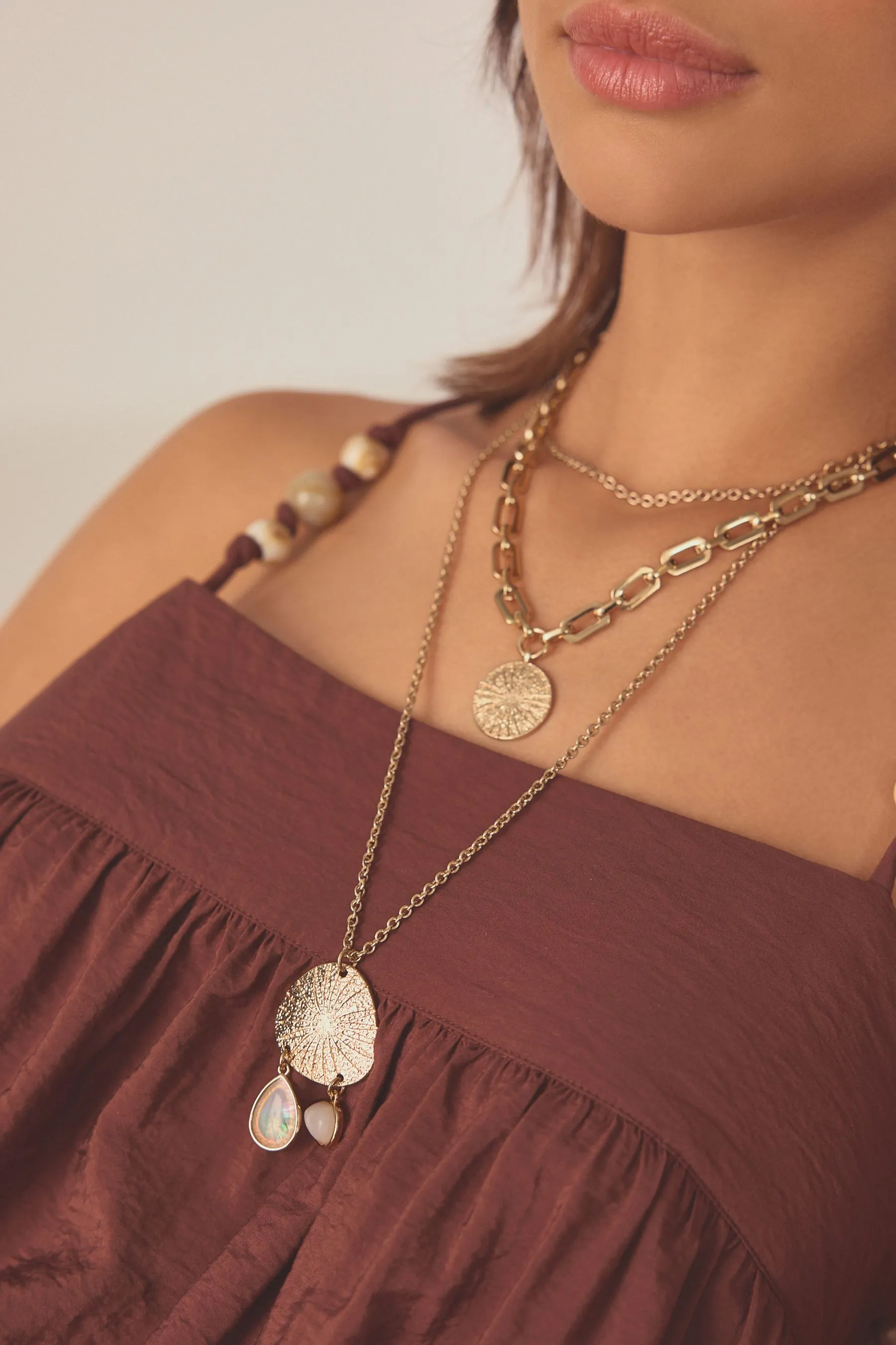 Oro  - Collana multistrato con dischi in acciaio riciclato